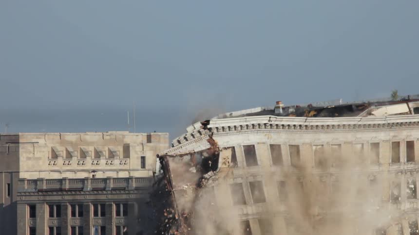 The large building suddenly collapses