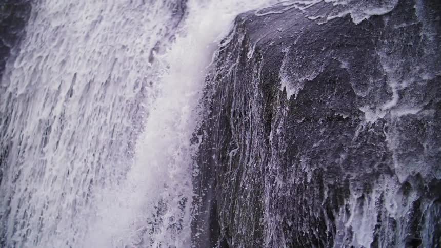 Water splashing down a cliff
