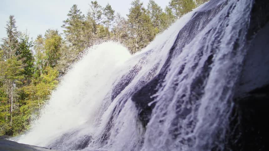 Water falls down a stream