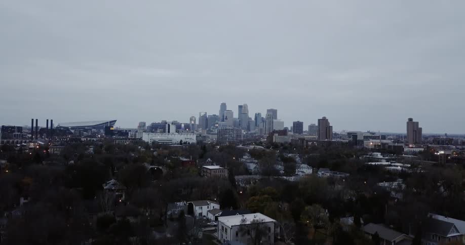 A city skyline sits motionless at dawn
