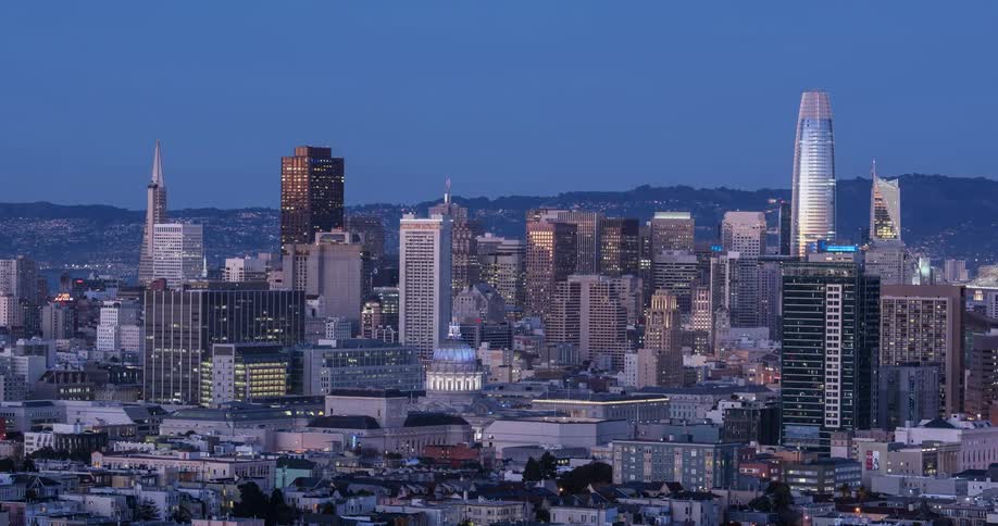 Night quickly falls over the city
