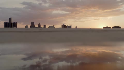 The water is calm before the city ahead