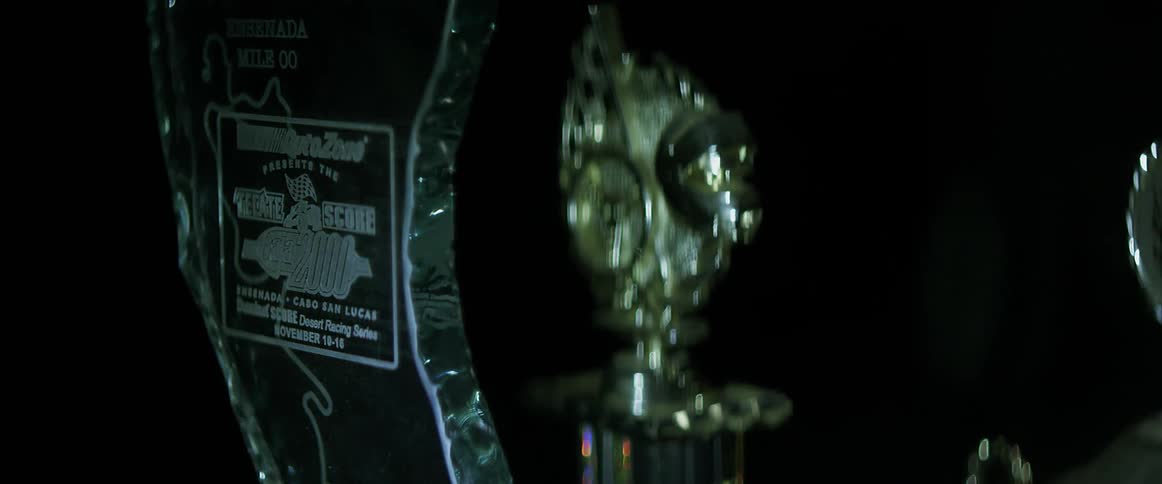 Light and shadow move across a trophy's surface