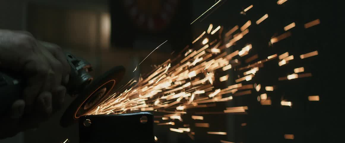 A rotary tool causes sparks as it is being used