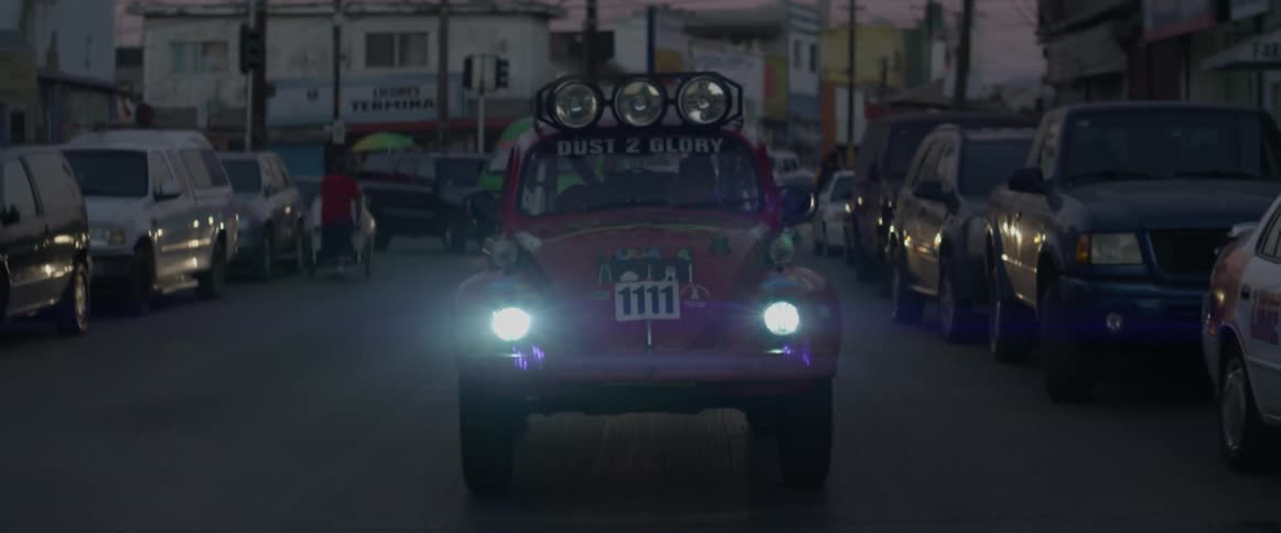 A car turns on its headlights