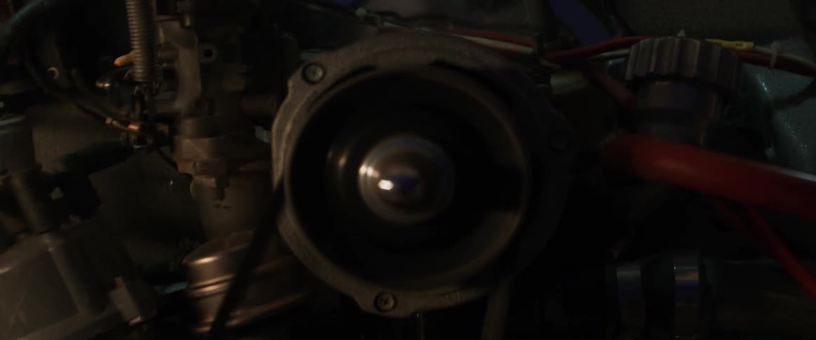 The belt in the engine is spinning
