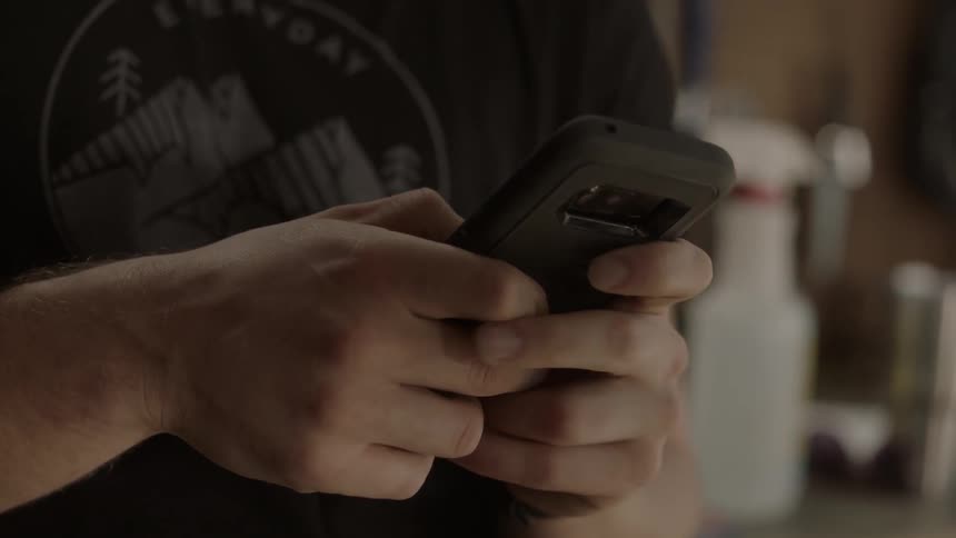 A man uses a smartphone