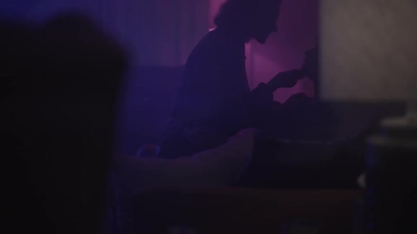 Silhouette of people and lasers