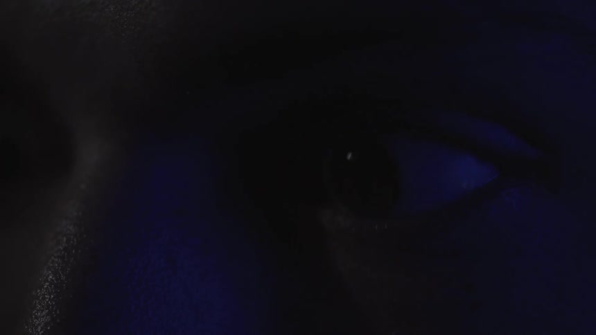 A person's eyeball looks all around