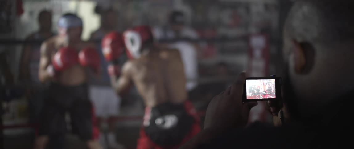 People in a boxing gym