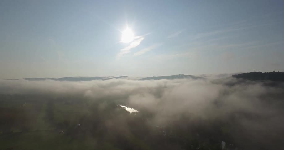 Sun over top of the clouds