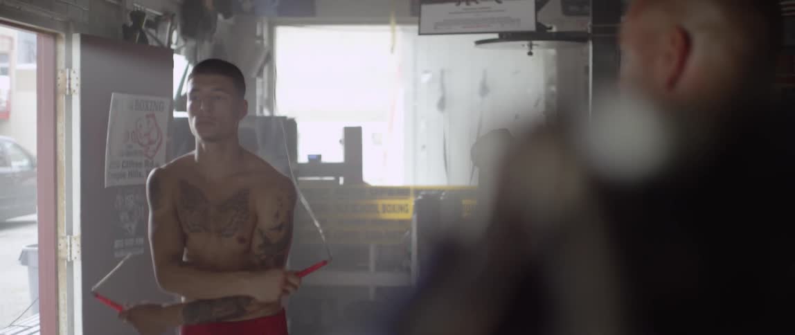 A boxer jumps rope for training