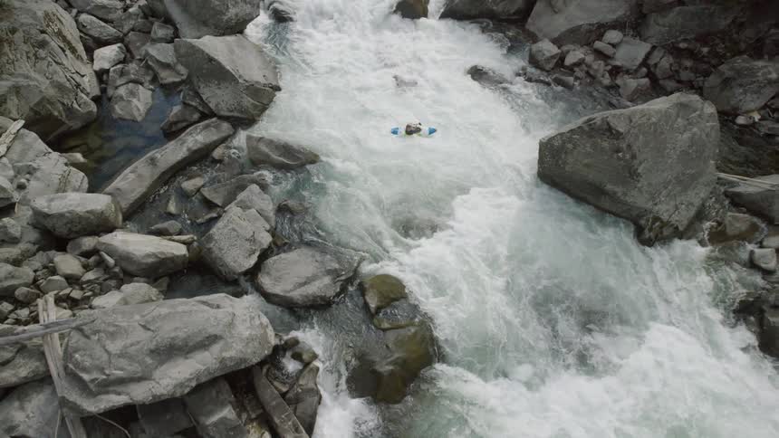 A person braving wild rapids