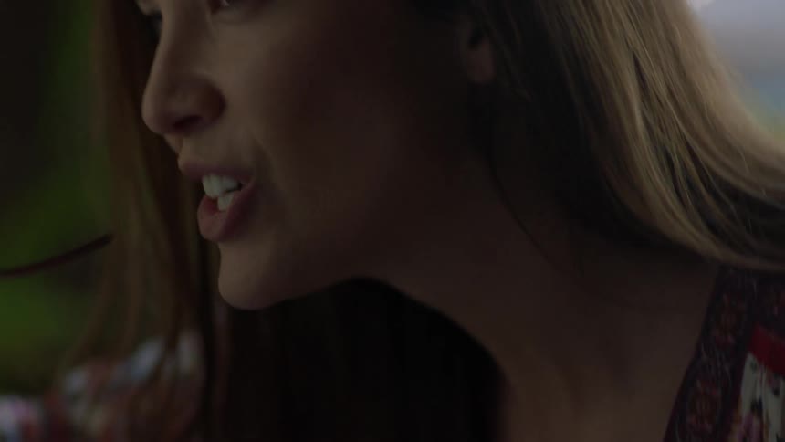 Woman eats food at a table