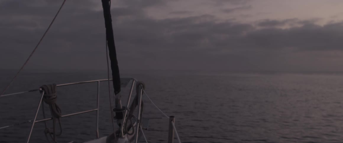 Boat sails on the sea on a cloudy day