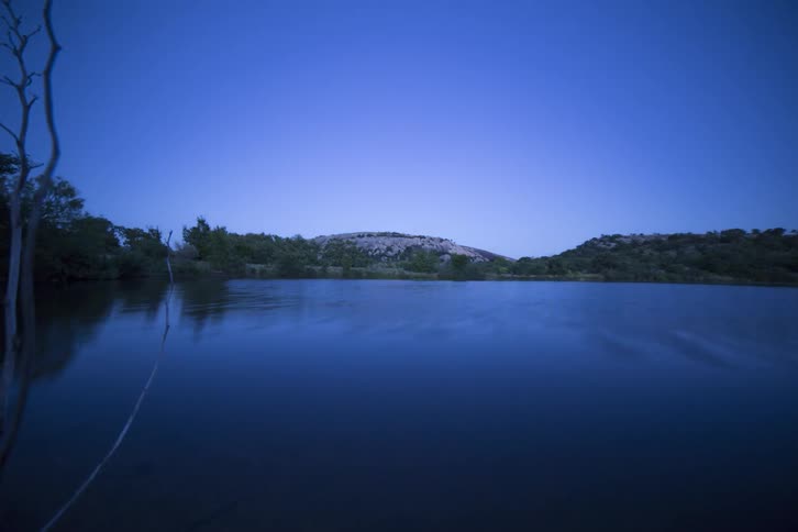 A lake lined by trees