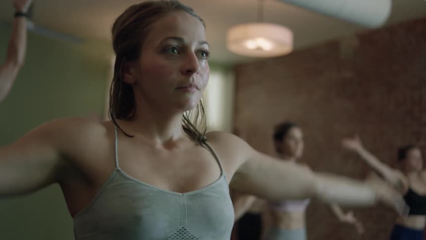 A group of women are doing yoga