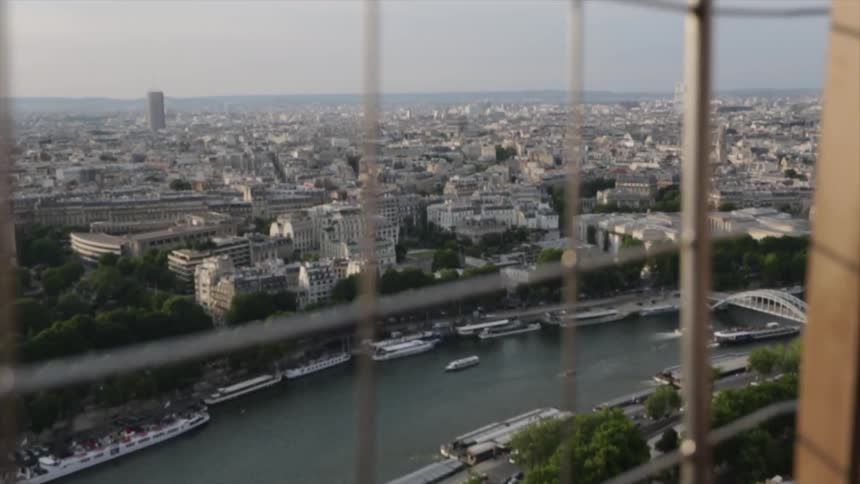 View looking through a window out at a city