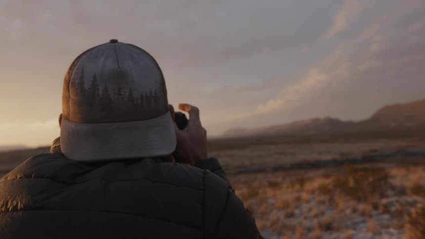 A man photographs nature