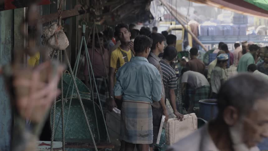 People work in a port