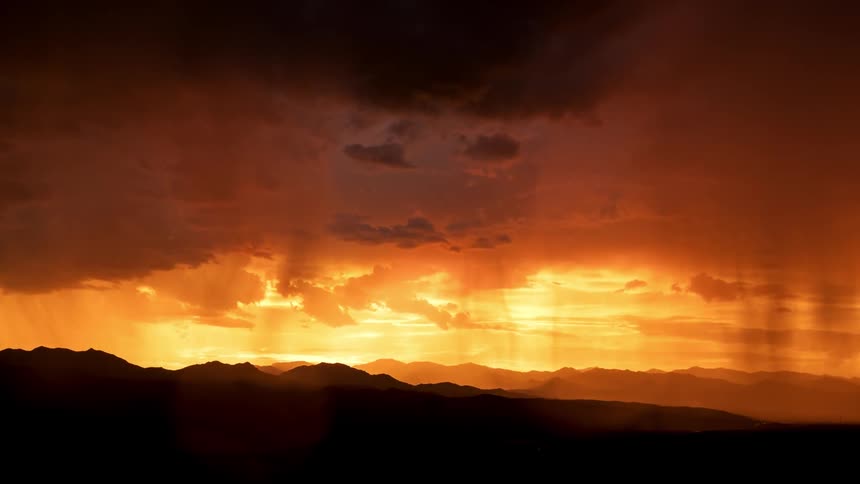 Sun shines as dark clouds roll overhead