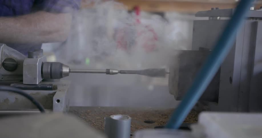 A man is operating a large machine