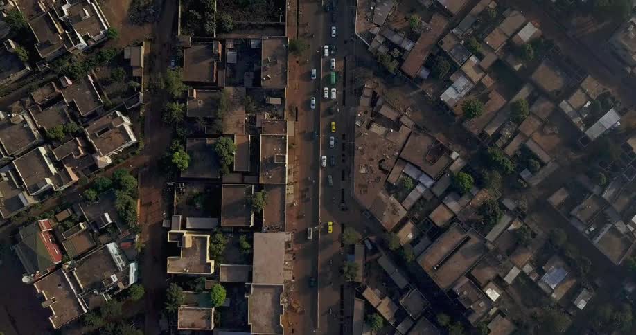 The roads running through the town are full of people driving