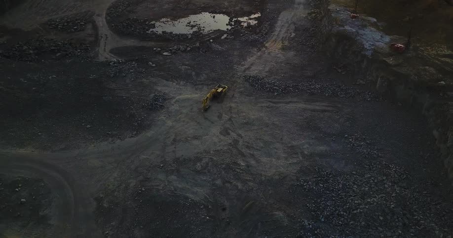 A construction site is vacant below