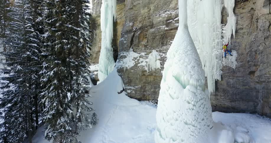 A man climbs up a rock face