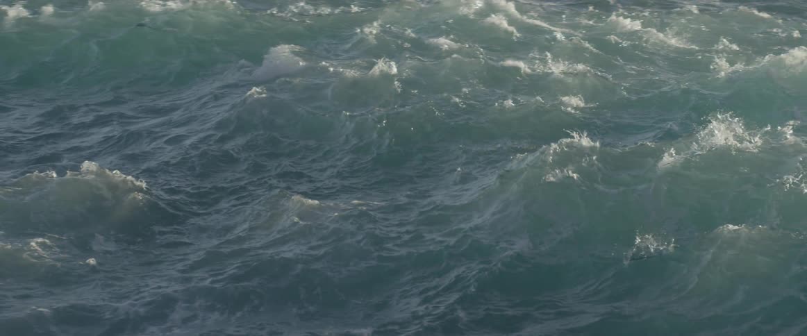 Waves roll and crash in the ocean