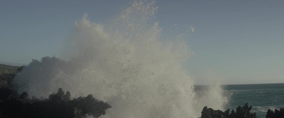 Water splashing up on rocks