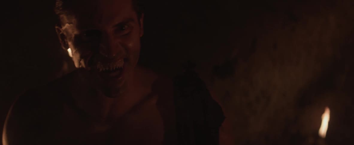 A monster screams and attacks inside a dark cave