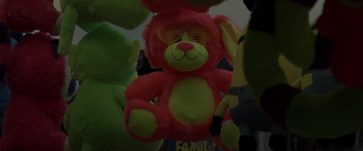 Stuffed animals hang all over