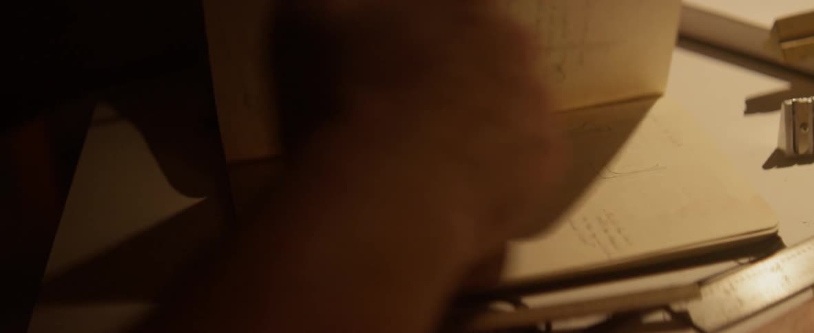 A person flips through a journal