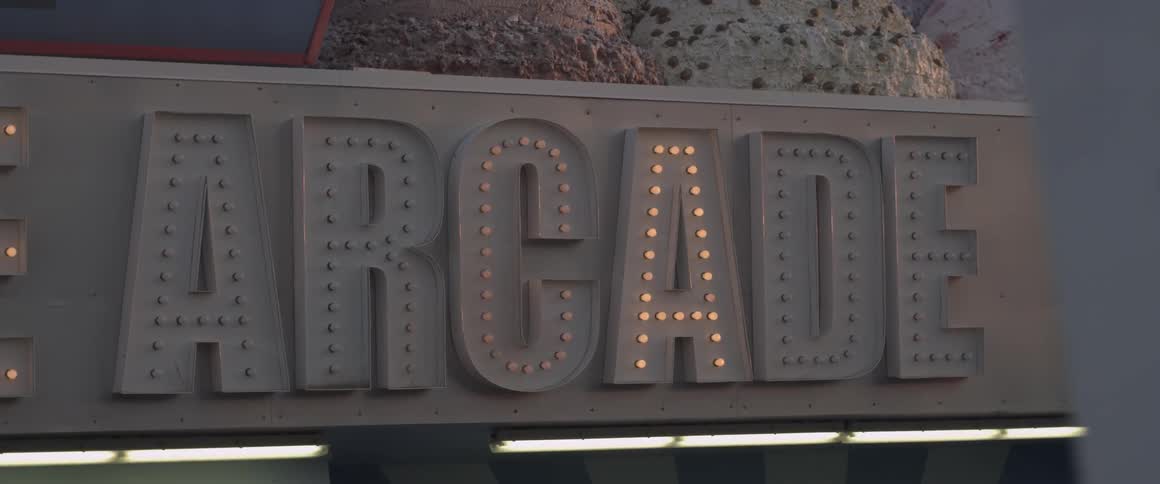 The sign lights up reading arcade