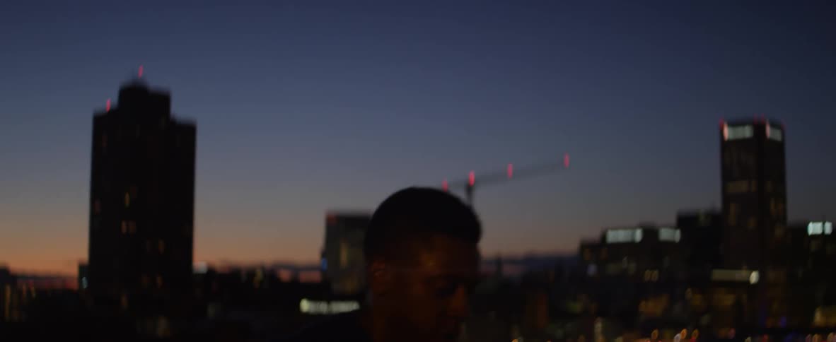 A man is running upstairs at night