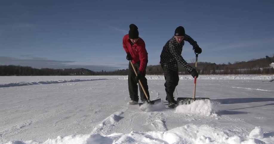 People shoveling snow