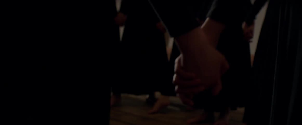 A circle of women holding hands