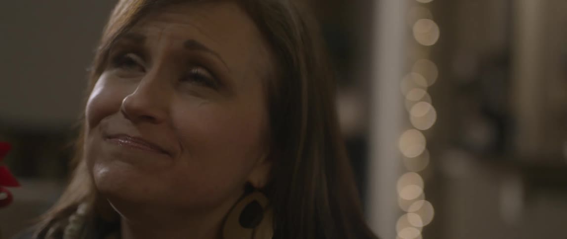 Woman looking up smiling