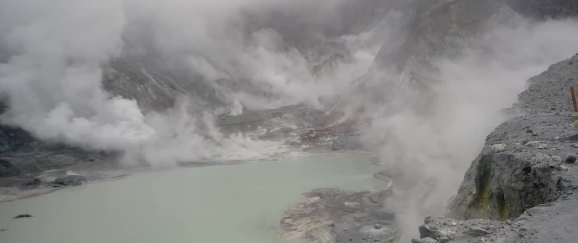 Clouds hover over mountains