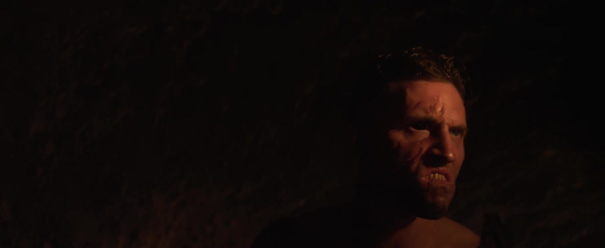 Angry looking man yells at night