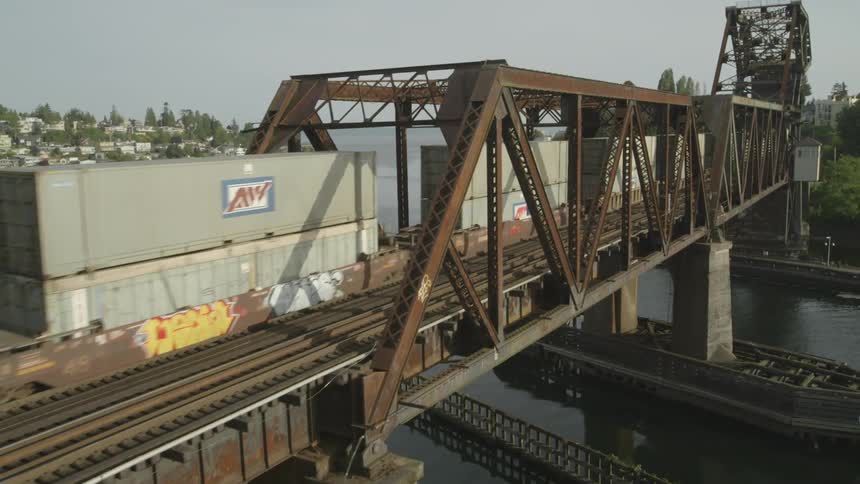Intermodal freight train crossing over a drawbridge