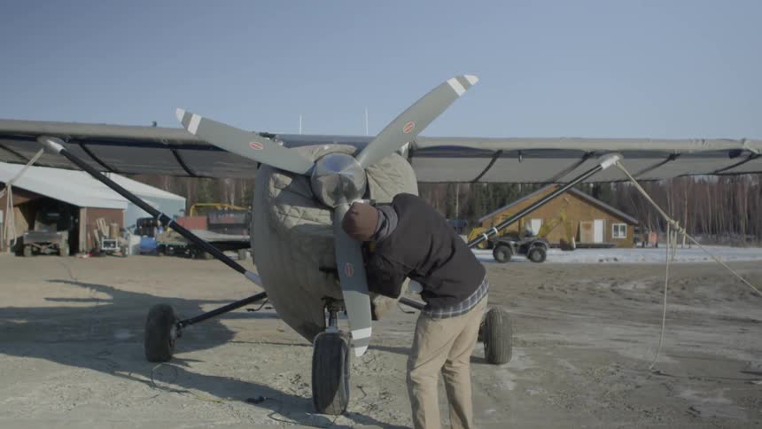 A person working on a plane