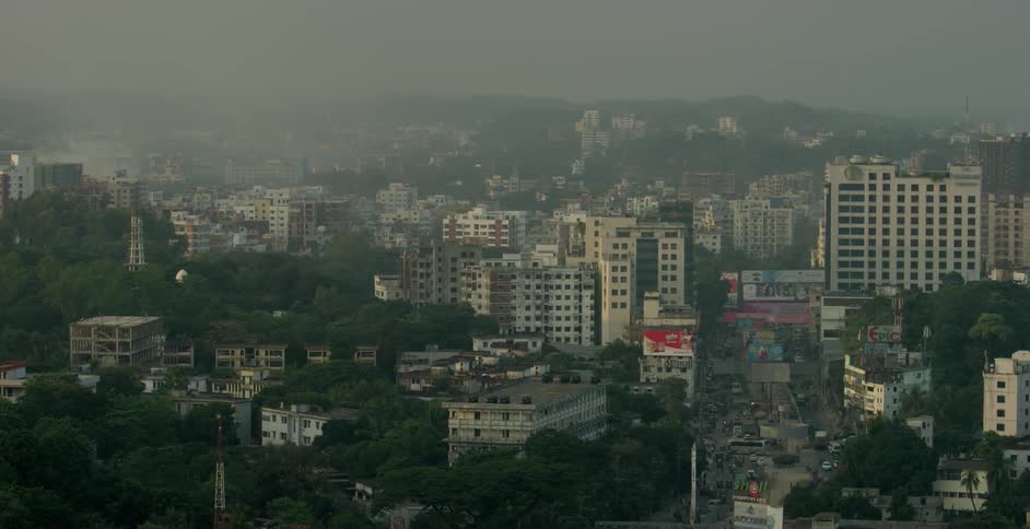 The town ahead is covered with fog