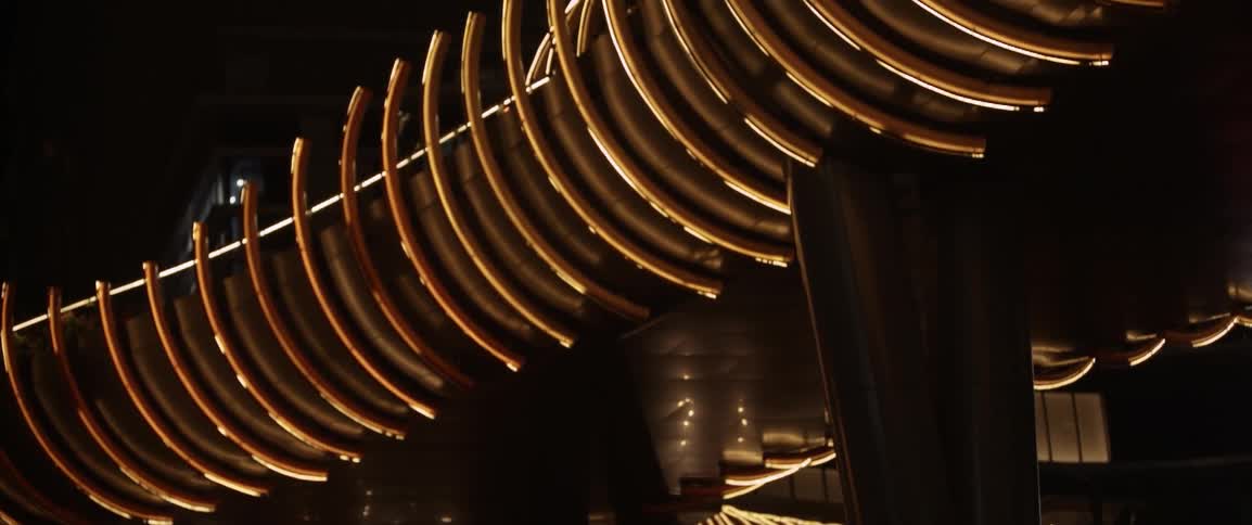 The lights are yellow and curved around the hoops