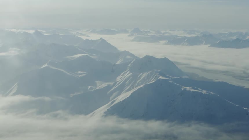 A mountain is shown from a plane
