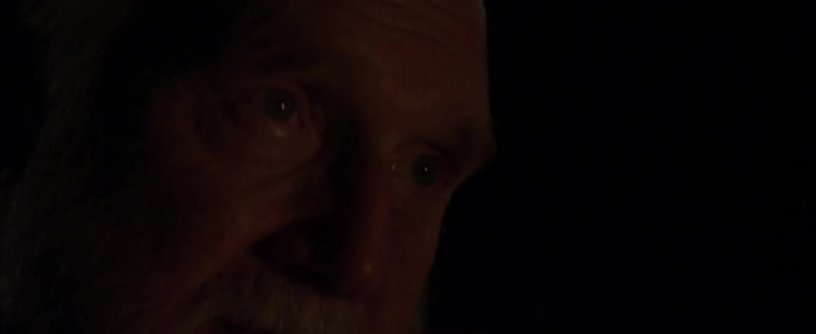 A man has his eyes closed before he blinks them open
