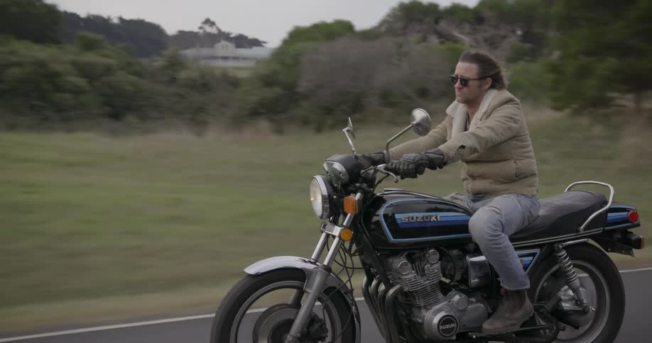 A man is having fun riding his motorcycle