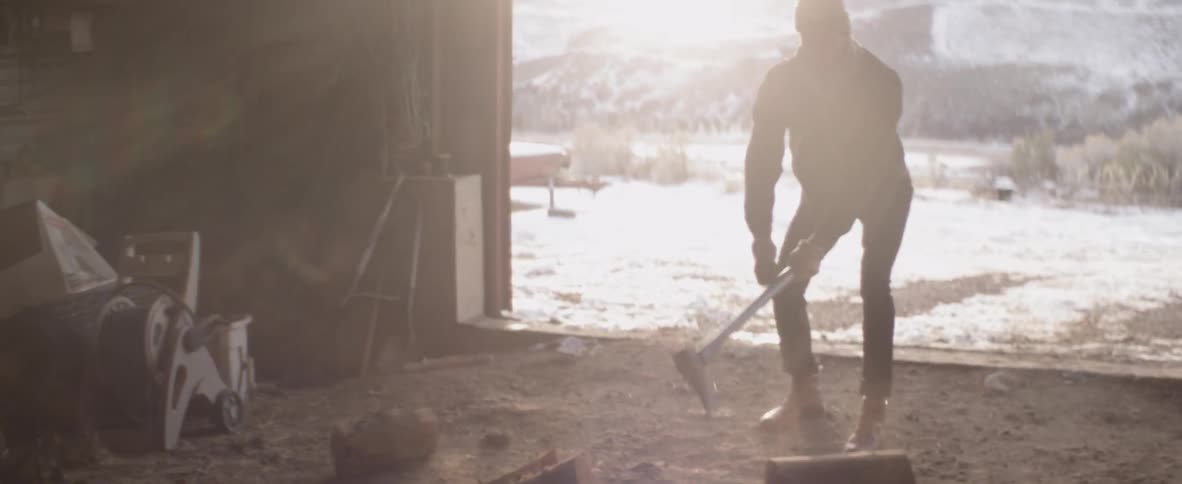 A man chops wood