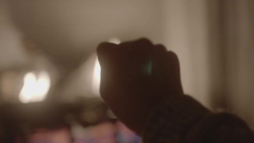A person is warming their hands